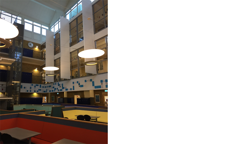 Kunskapsskolan School atrium with sound absorption fins Kunskapsskolan School atrium with sound absorption fins